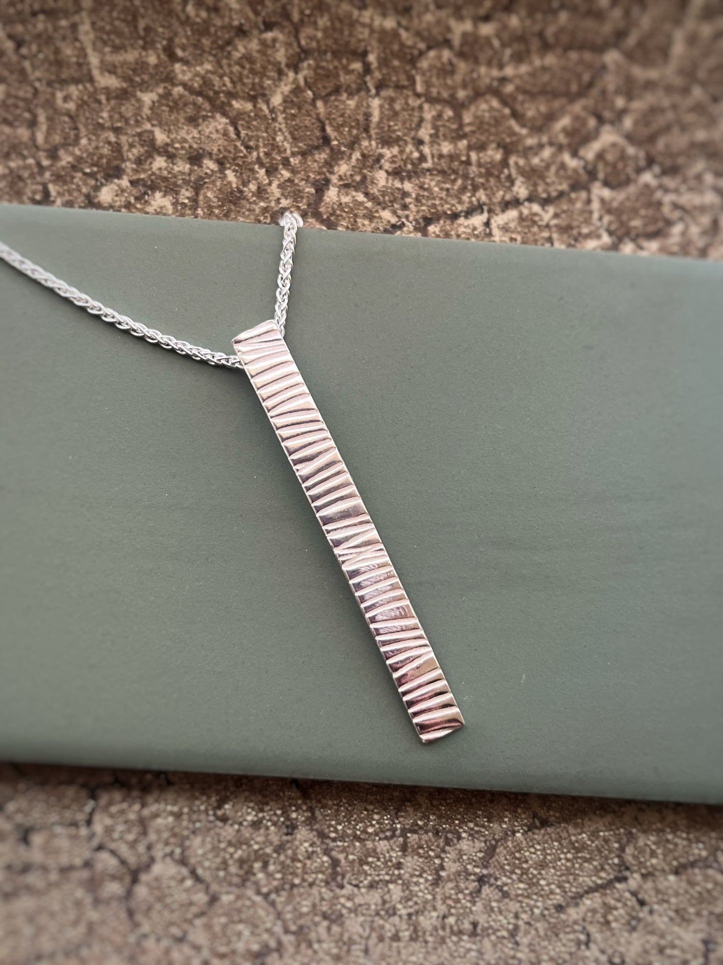 Sterling silver textured bark pendant