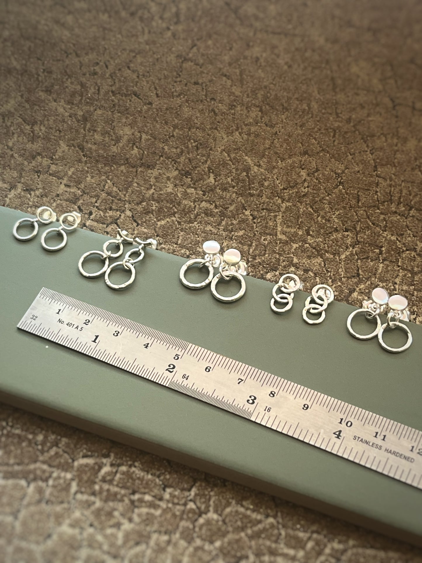 3 silver hammered hoop earrings