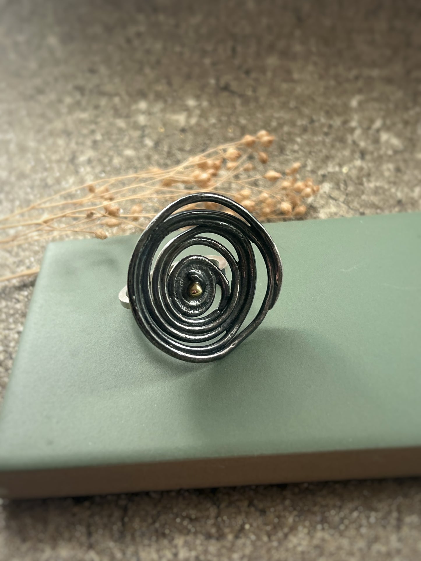 Oxidised blackened silver & 18ct gold swirl statement ring