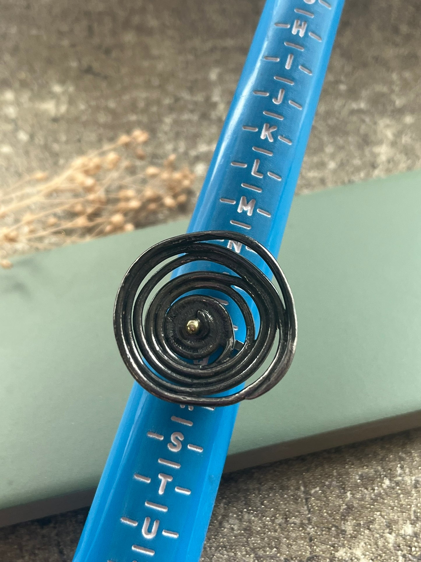 Oxidised blackened silver & 18ct gold swirl statement ring