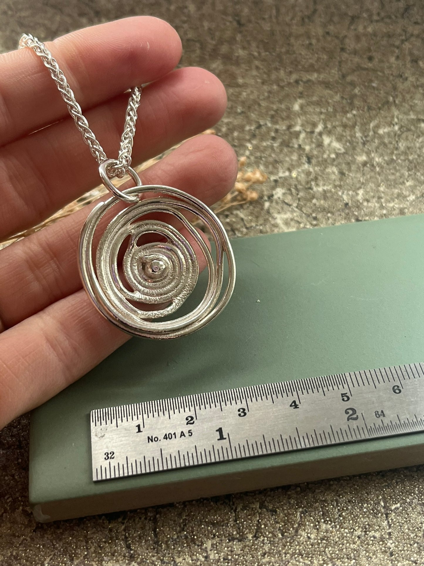 Sterling silver swirl statement pendant