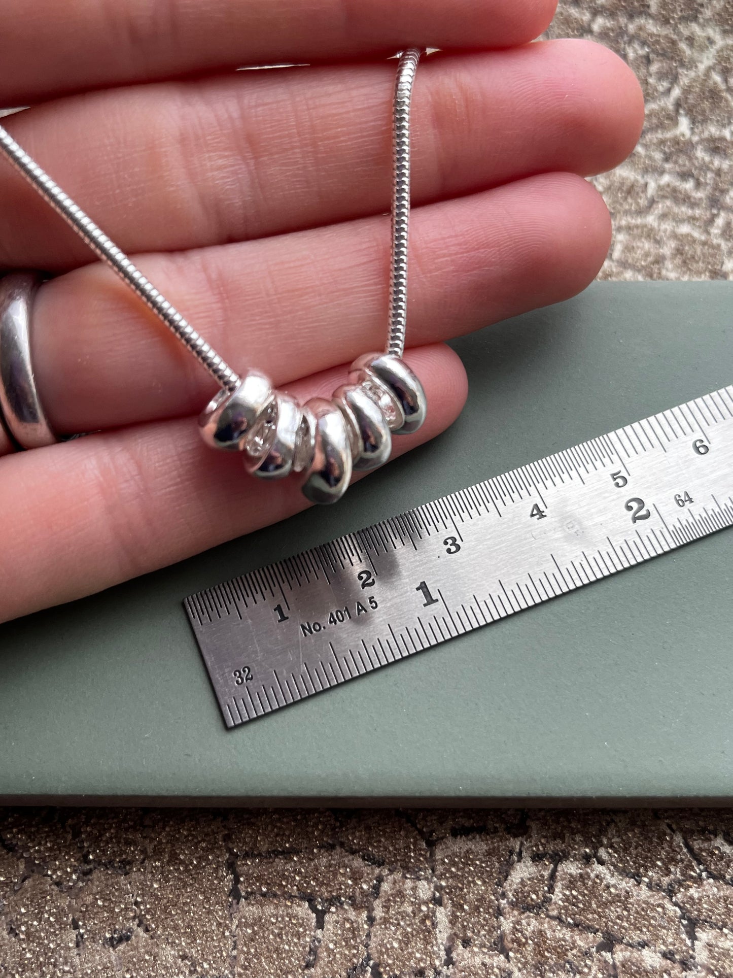Sterling silver 5 pebble pendant necklace