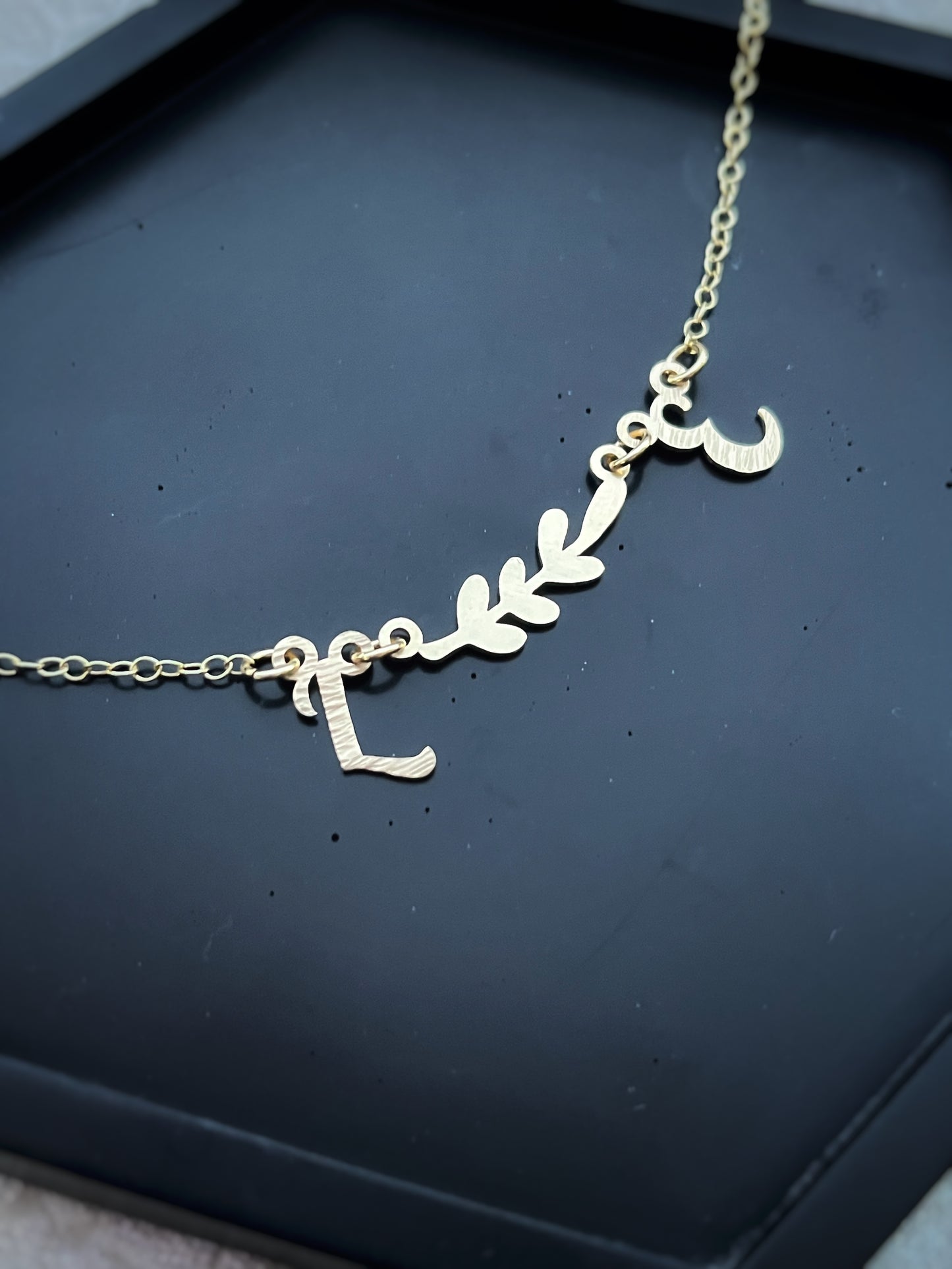 Solid 9ct gold double initial letter leaf branch necklace, a handmade hammered & textured recycled gold necklace