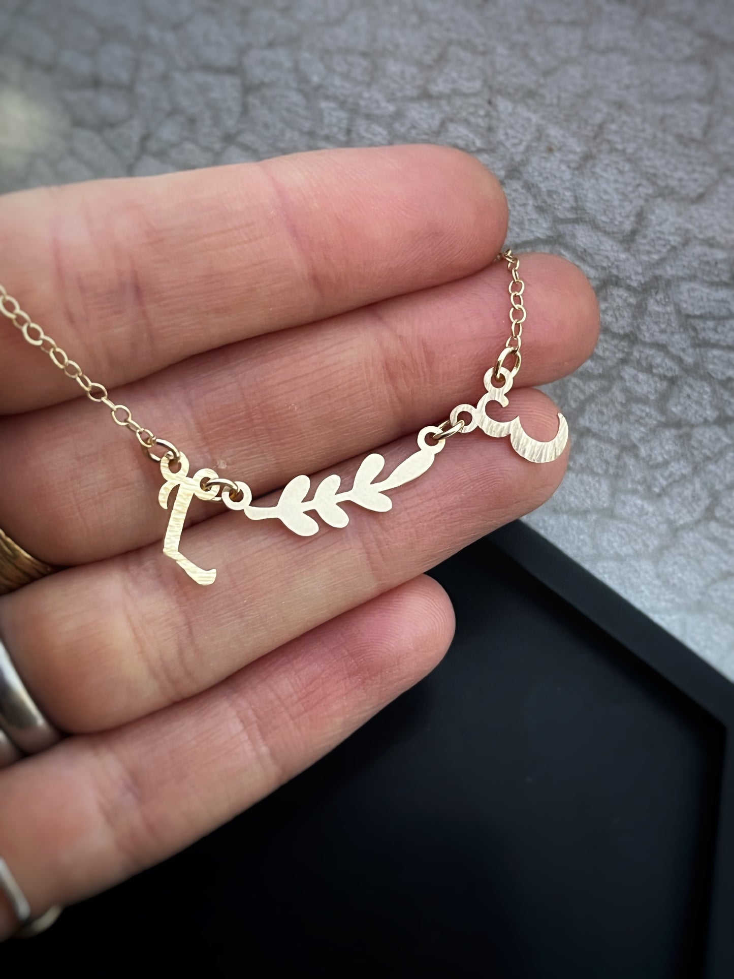 Solid 9ct gold double initial letter leaf branch necklace, a handmade hammered & textured recycled gold necklace