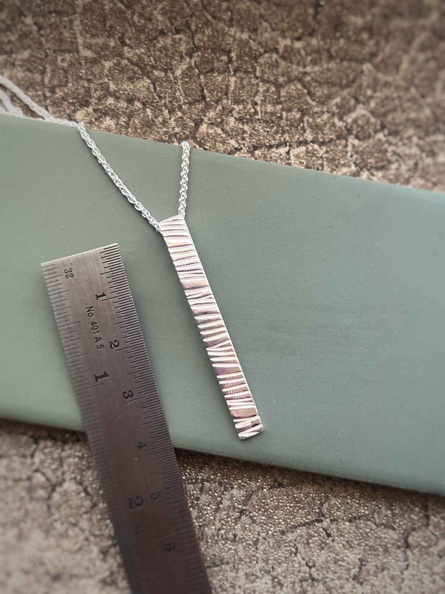 Sterling silver textured bark pendant