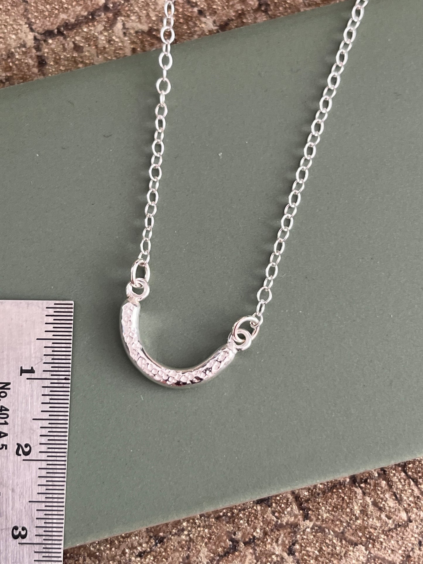 Sterling silver dimple textured curved chunky bar necklace