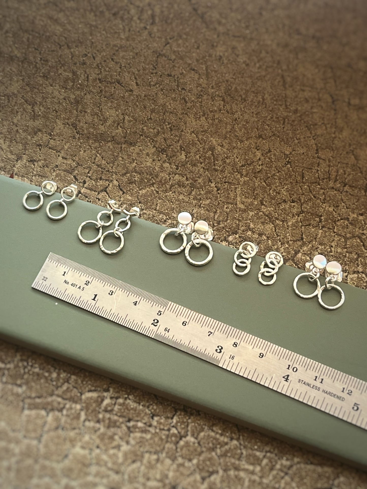 3 silver hammered hoop earrings