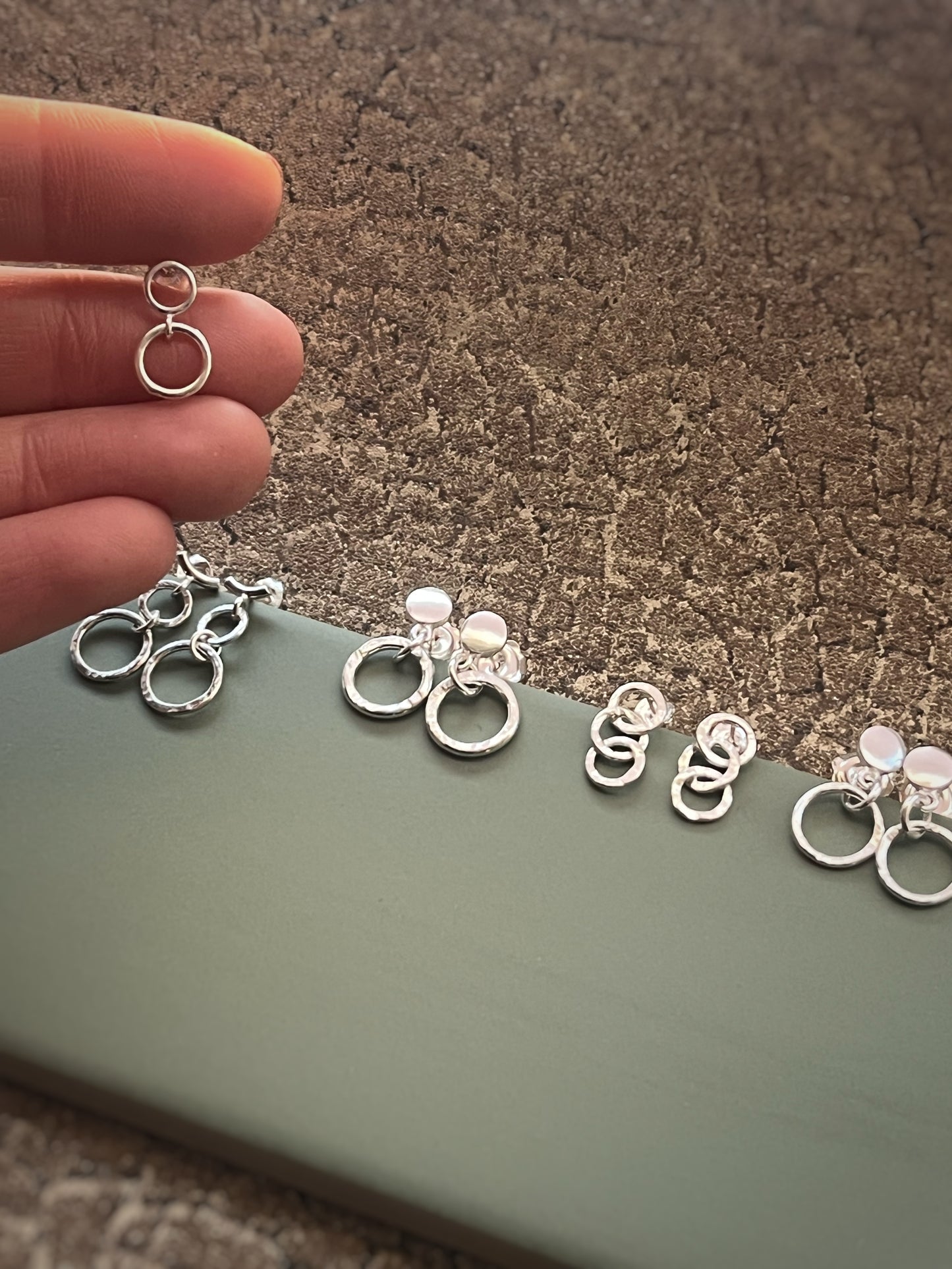 3 silver hammered hoop earrings