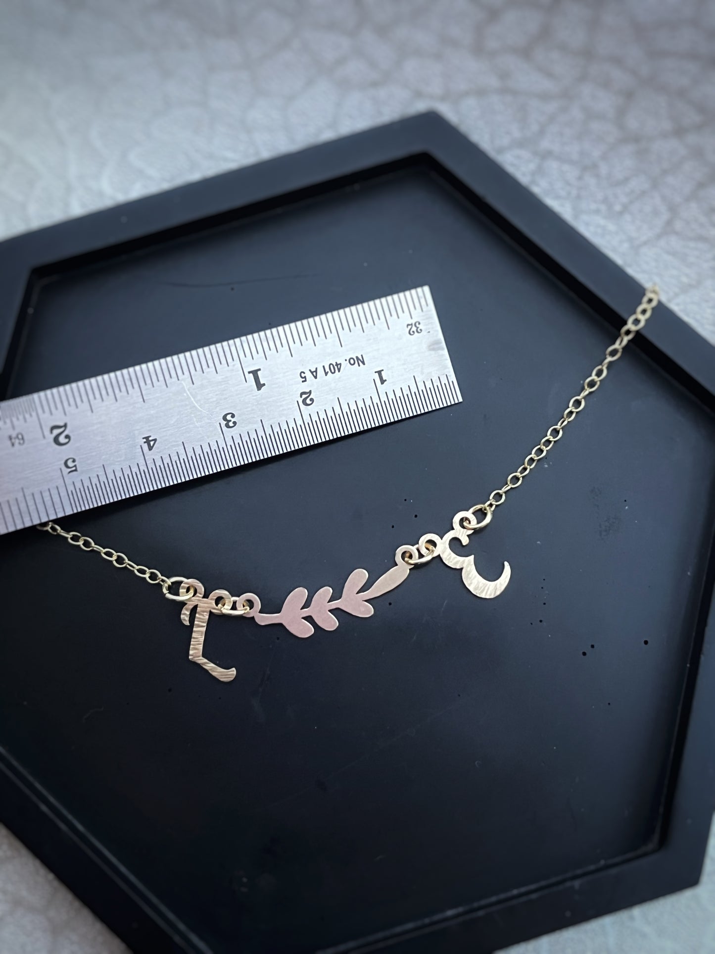 Solid 9ct gold double initial letter leaf branch necklace, a handmade hammered & textured recycled gold necklace