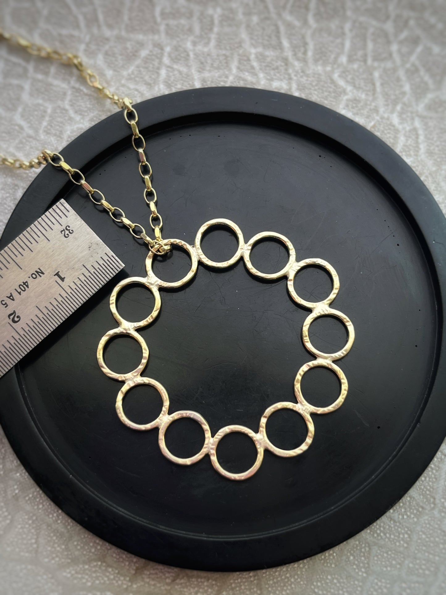 Solid 9ct gold 12 hoop statement circle pendant, a handmade hammered textured necklace