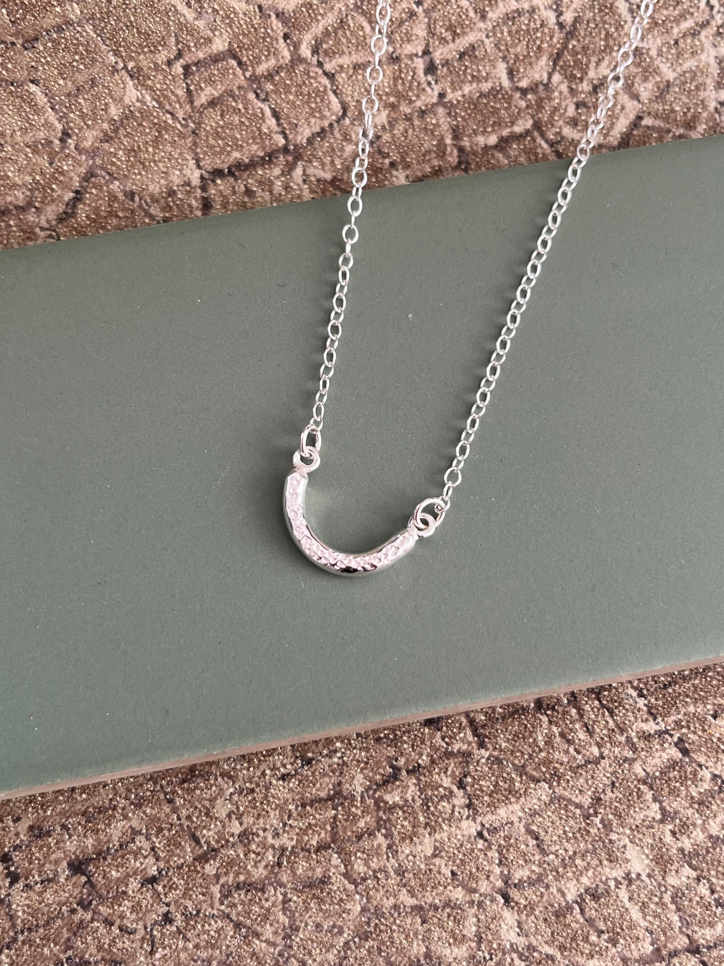 Sterling silver dimple textured curved chunky bar necklace