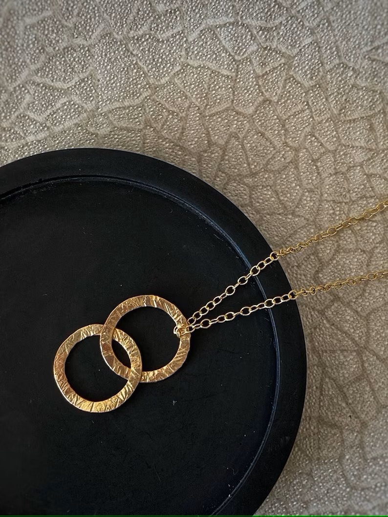 Solid 9ct gold large interlocking circle pendant, a handmade hammered textured necklace