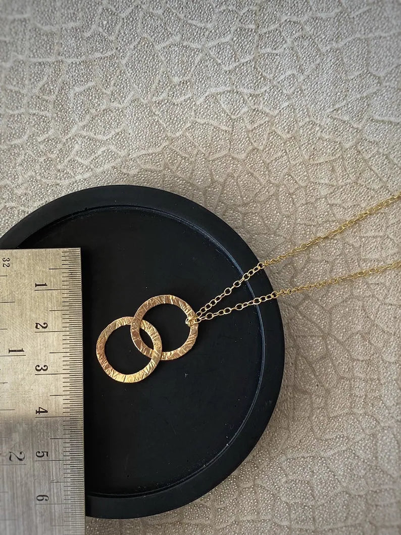 Solid 9ct gold large interlocking circle pendant, a handmade hammered textured necklace