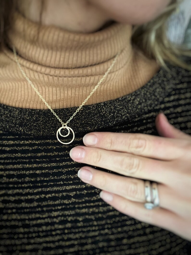 Solid 9ct gold interlocking circle pendant, a handmade hammered textured necklace