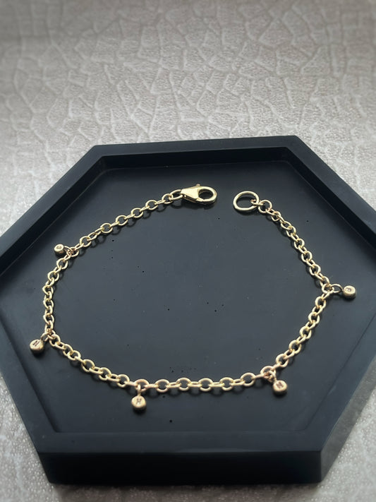Solid 9ct gold personalised 5 letter pebble charm bracelet, recycled initial handmade chain bracelet