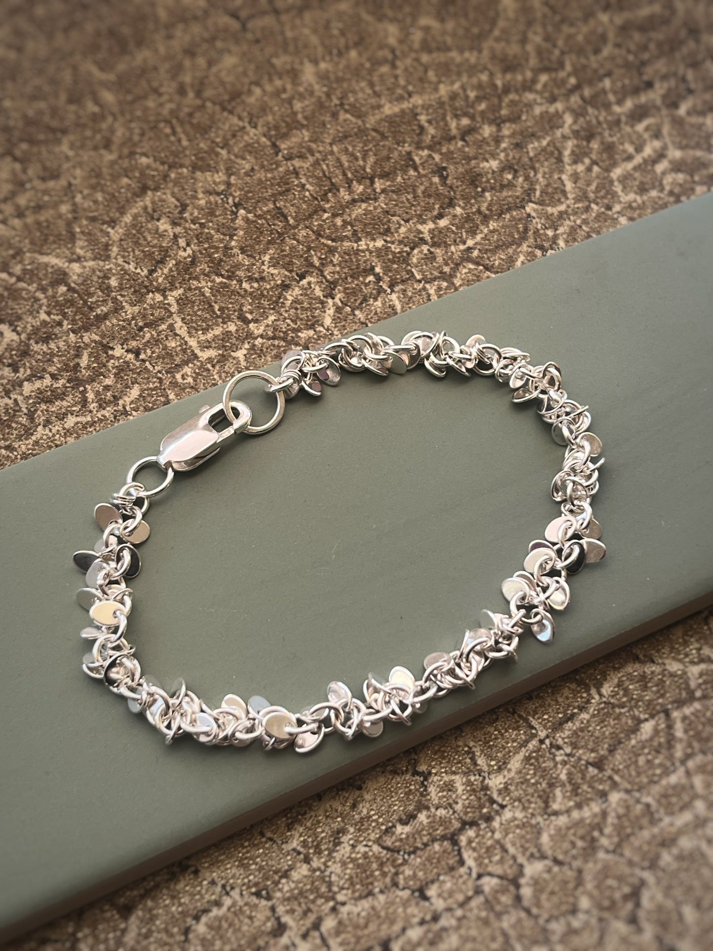 Multi disc sterling silver bracelet