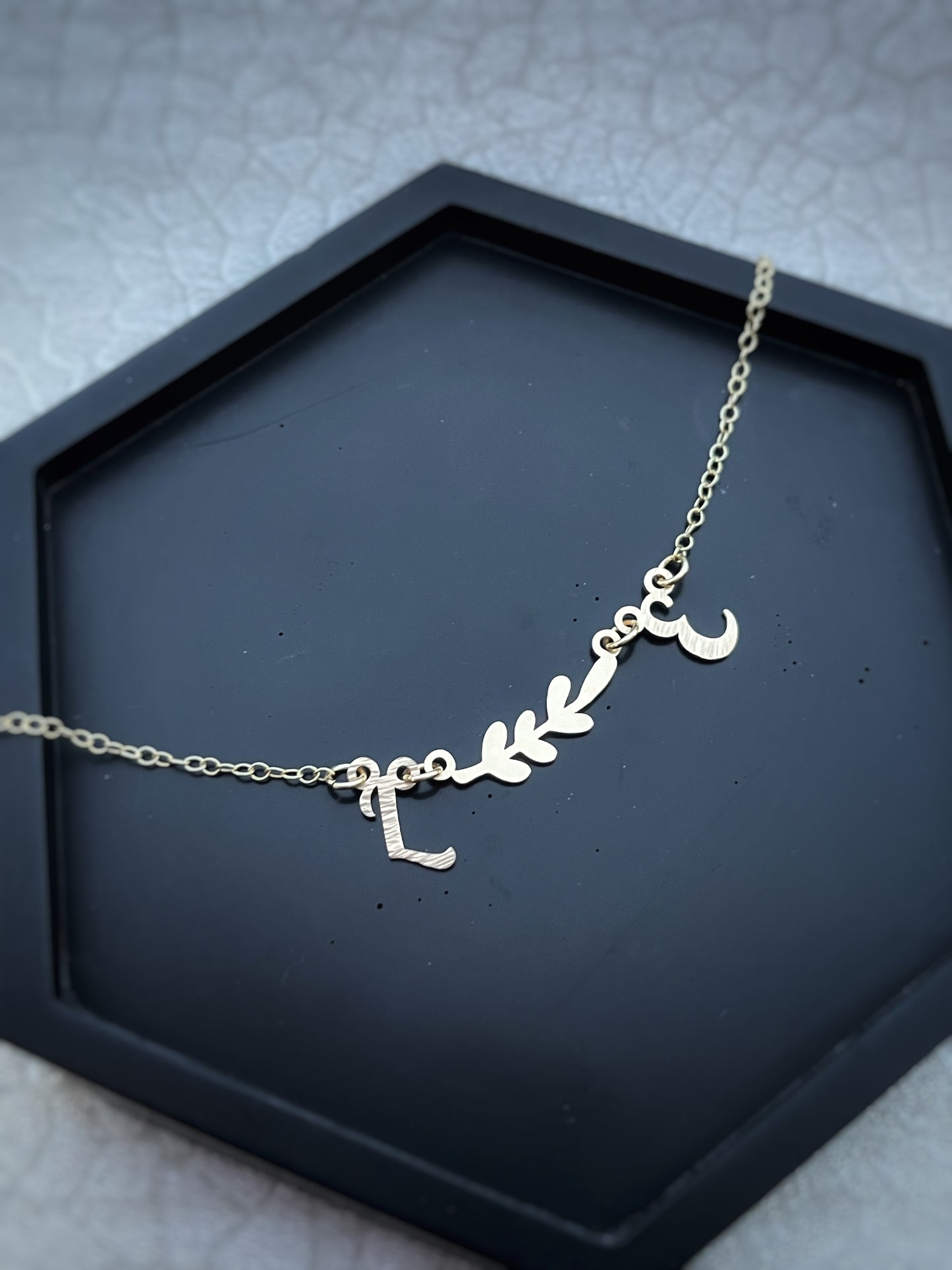 Solid 9ct gold double initial letter leaf branch necklace, a handmade hammered & textured recycled gold necklace