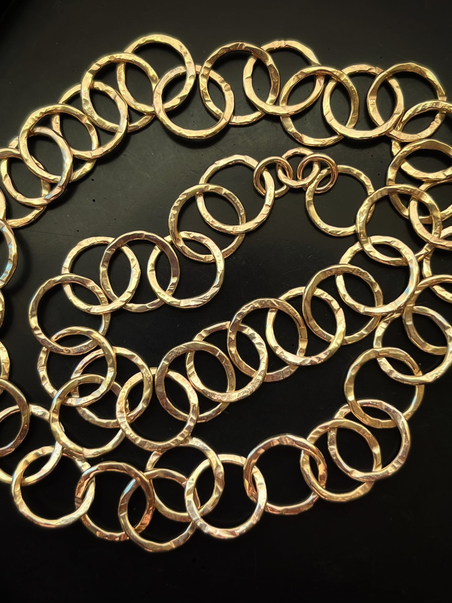 Solid 9ct recycled yellow gold, a hammered handmade hoop interlocking hoop tree bark texture necklace