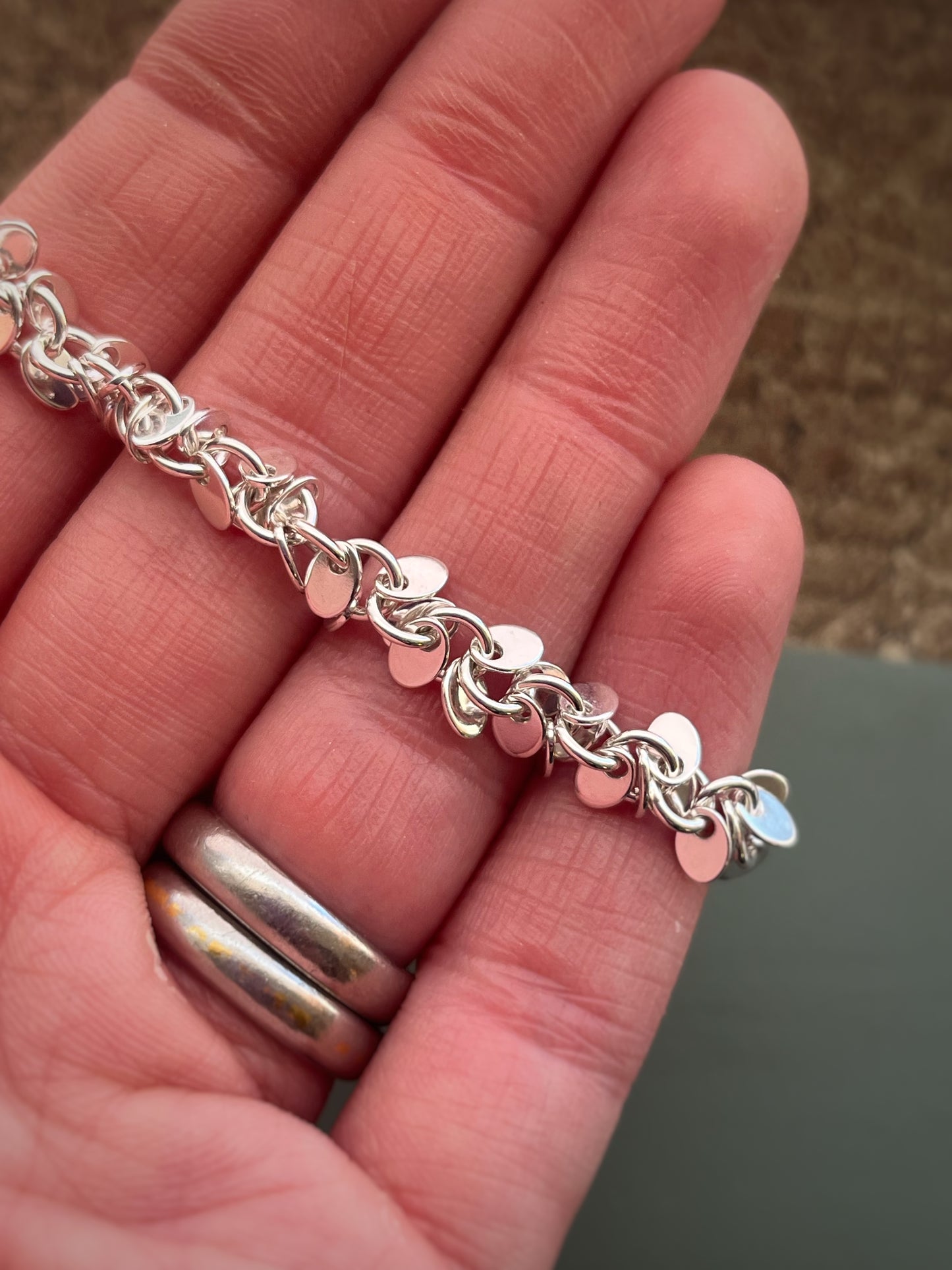 Multi disc sterling silver bracelet