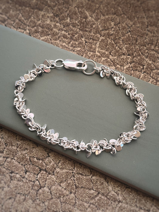 Multi disc sterling silver bracelet