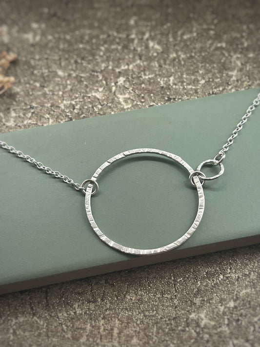 Sterling silver large hammered hoop necklace