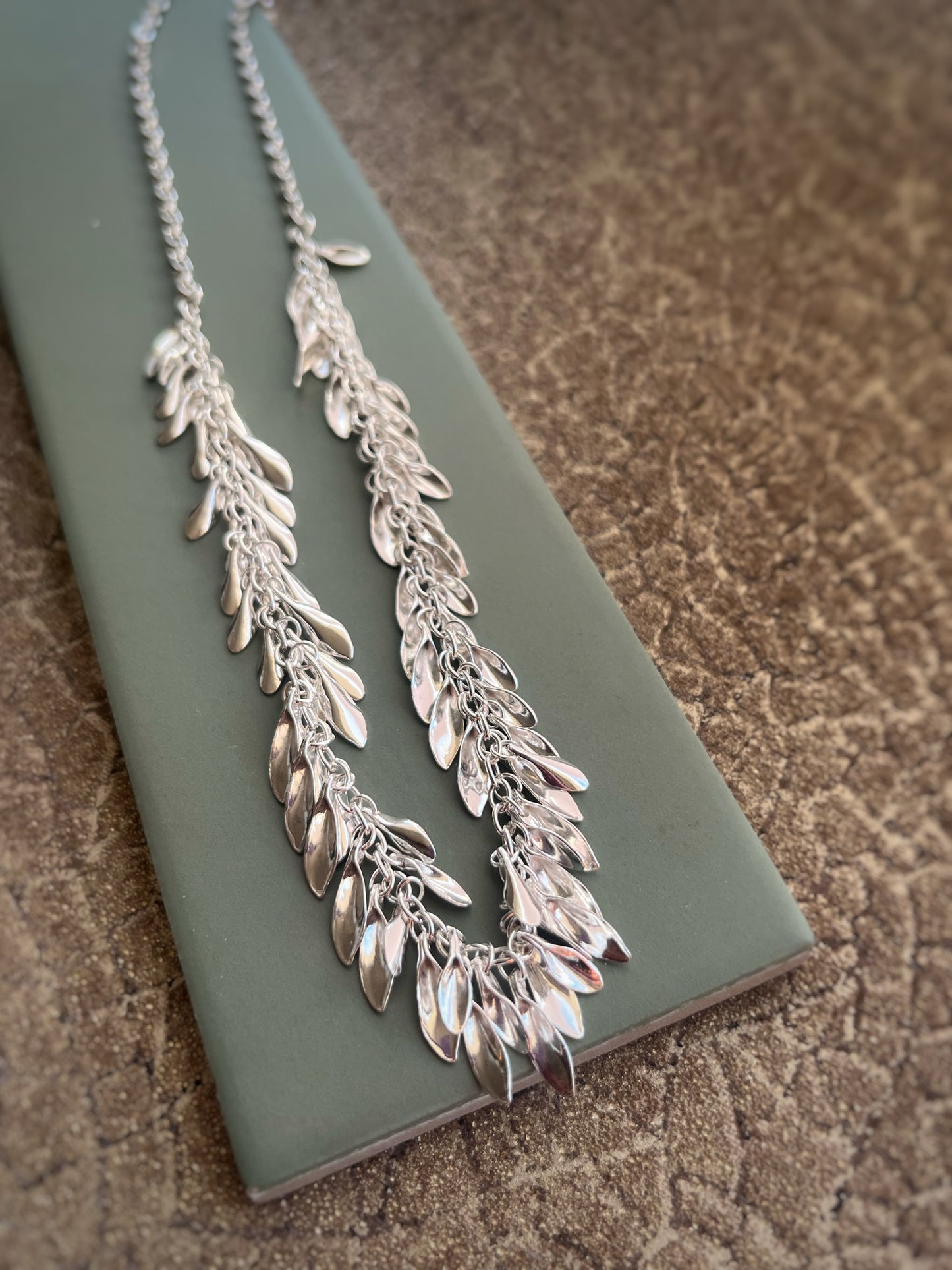 Multiple leaf statement sterling silver necklace