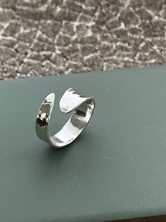 Hammered sterling silver cross over ring, adjustable size O