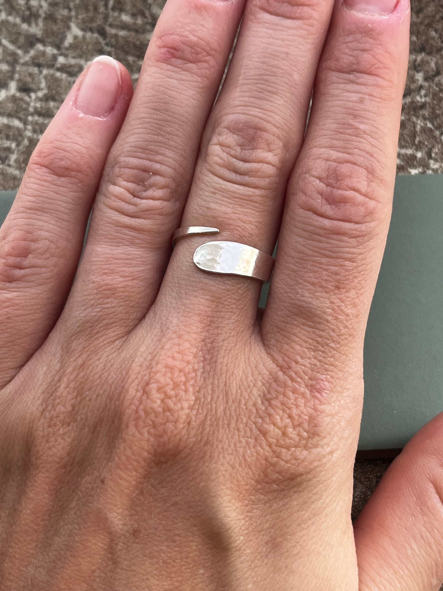 Textured cross over sterling silver ring size O adjustable