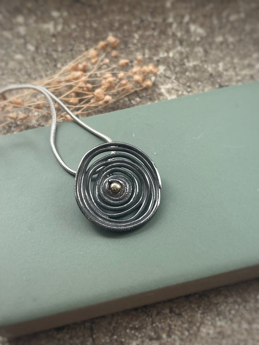 Oxidised blackened silver & 18ct gold swirl large pendant