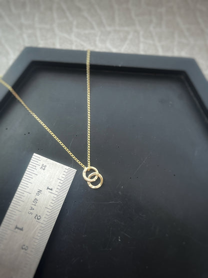 Solid 9ct yellow gold tiny interlocking double 5mm hammered hoop pendant, recycled small simple tree bark stacking hoop