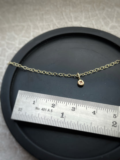 Solid 9ct gold tiny letter pebble bracelet, recycled personalised initial stacking handmade