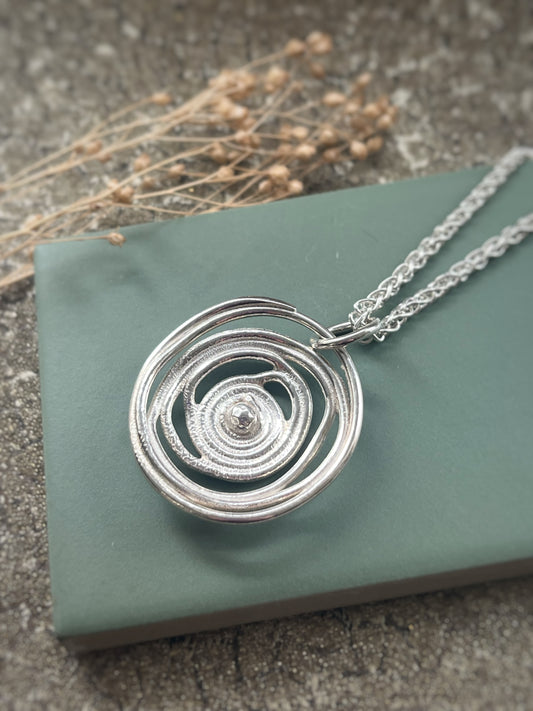 Sterling silver swirl statement pendant