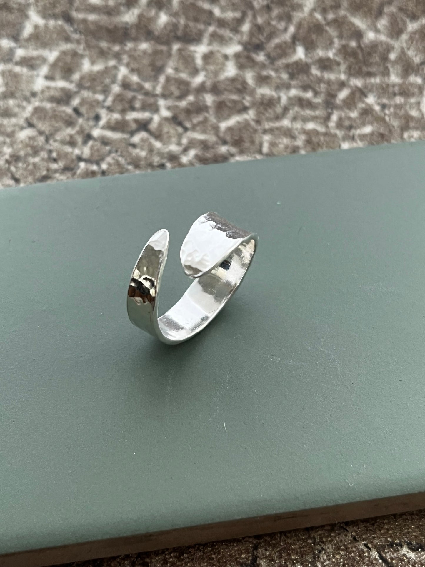 Hammered sterling silver cross over ring, adjustable size O