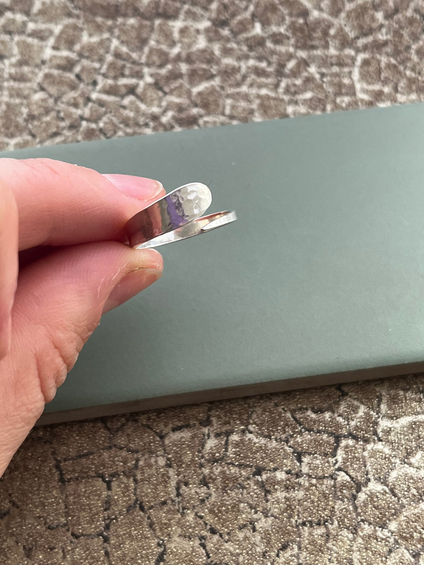 Textured cross over sterling silver ring size O adjustable