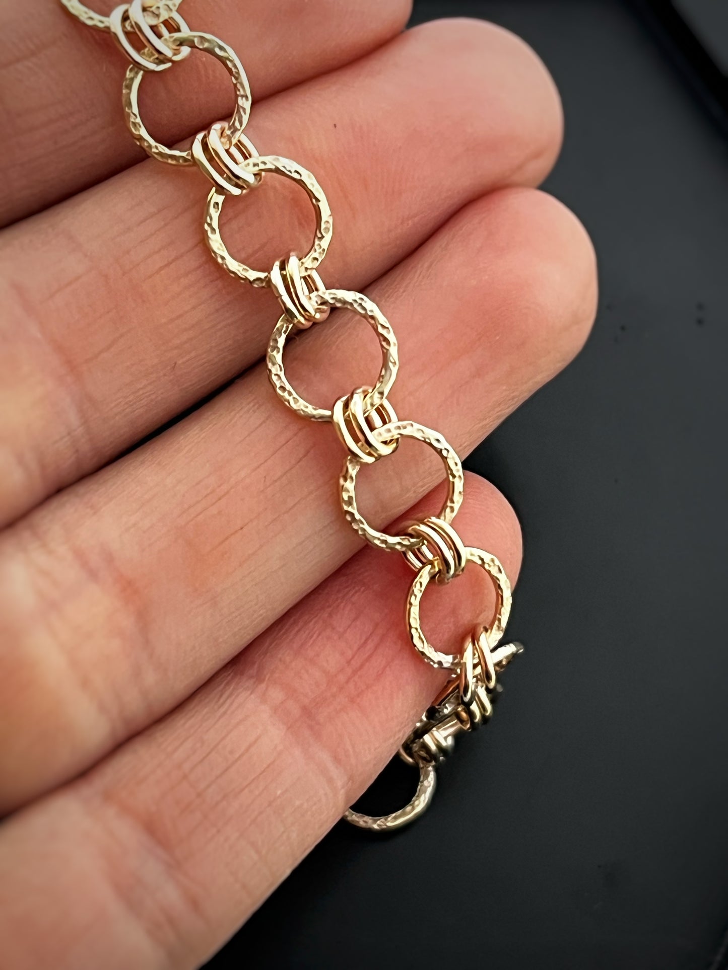 Solid 9ct gold hammered dimple sand coastal beach interlocking double yellow gold hoop bracelet