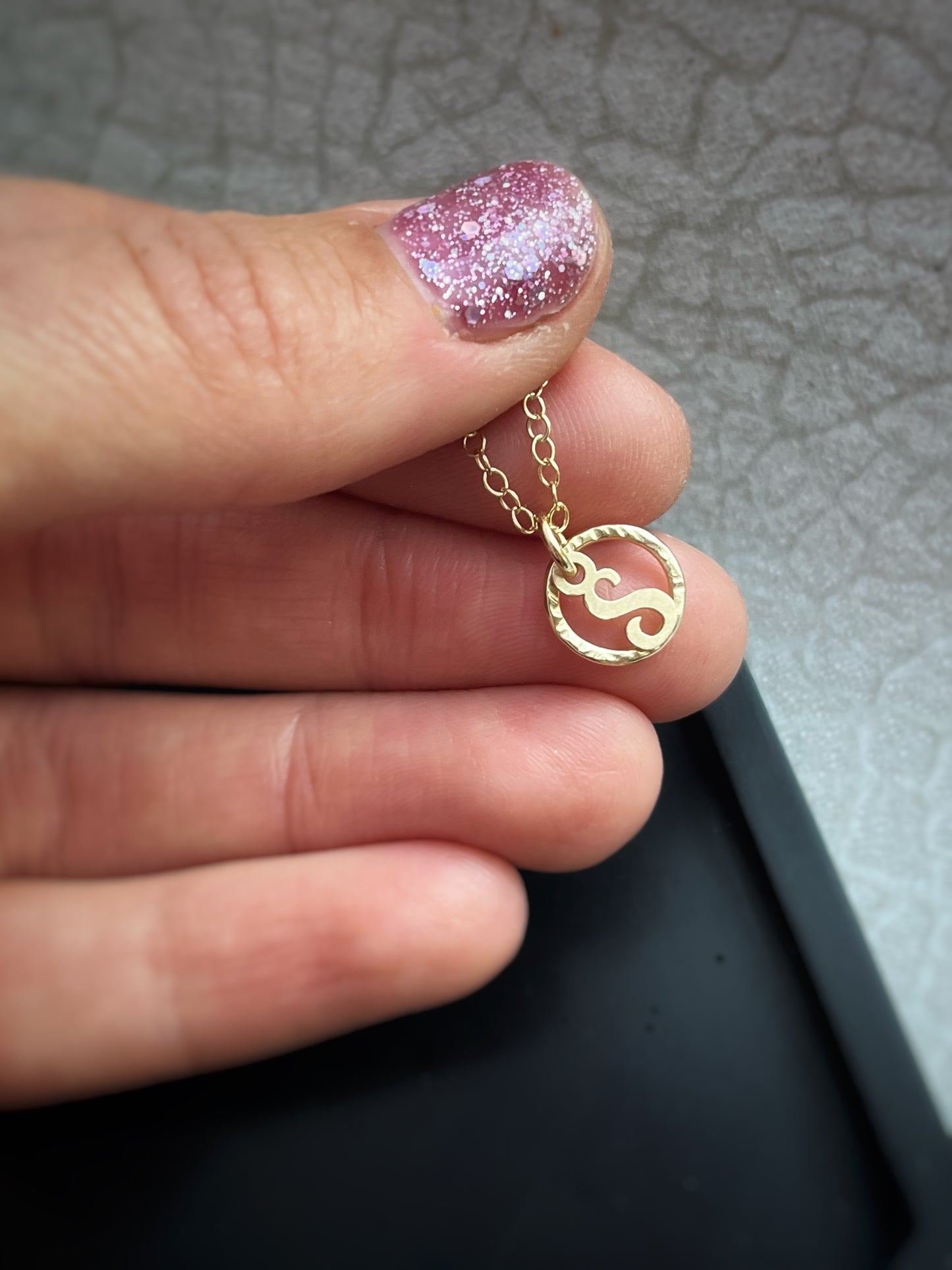 Solid 9ct gold personalised letter pendant in hammered hoop, handmade tree bark texture initial pendant inspired by nature on a solid gold chain