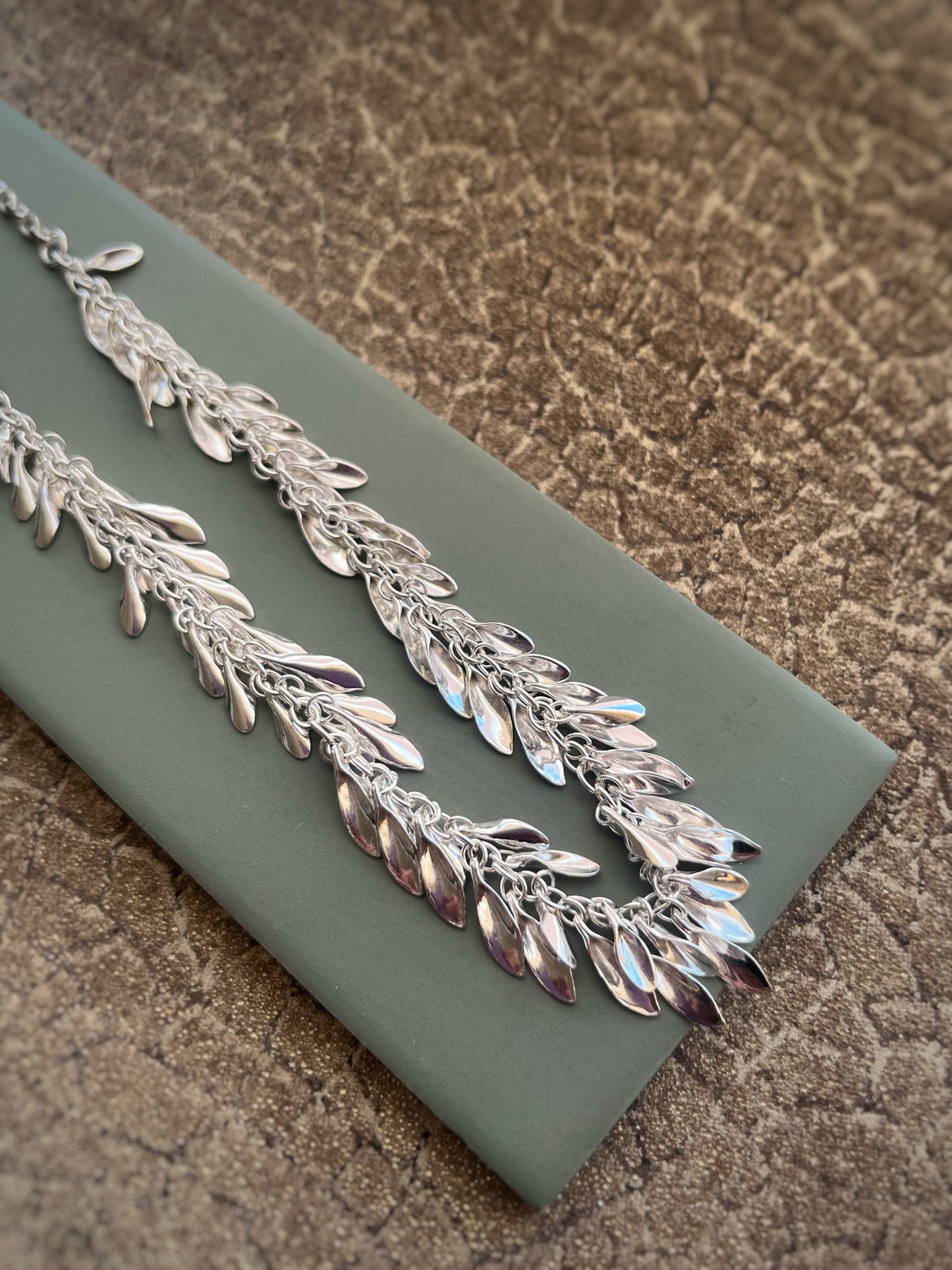 Multiple leaf statement sterling silver necklace