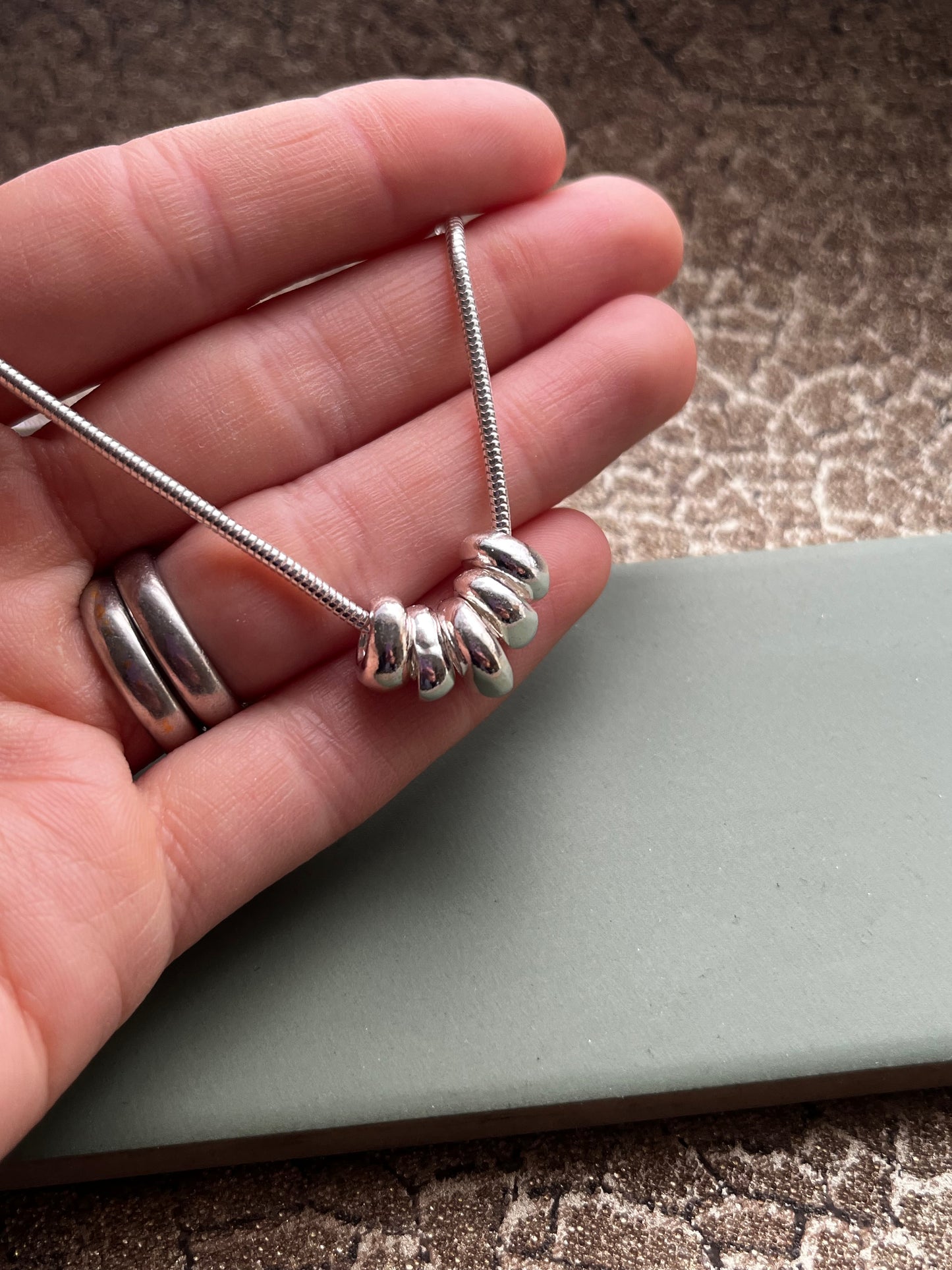 Sterling silver 5 pebble pendant necklace