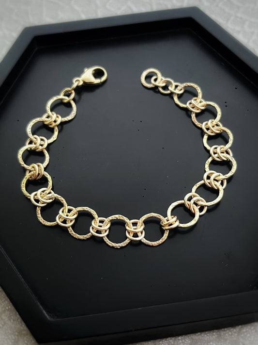 Solid 9ct gold hammered dimple sand coastal beach interlocking double yellow gold hoop bracelet