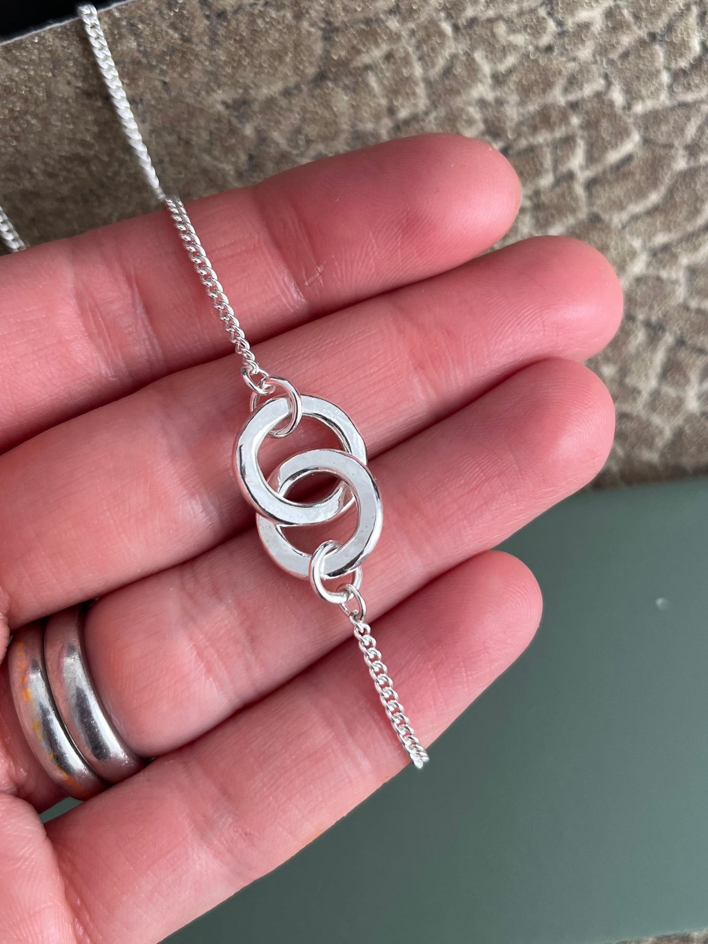 Sterling silver hammered chunky interlocking hoop necklace