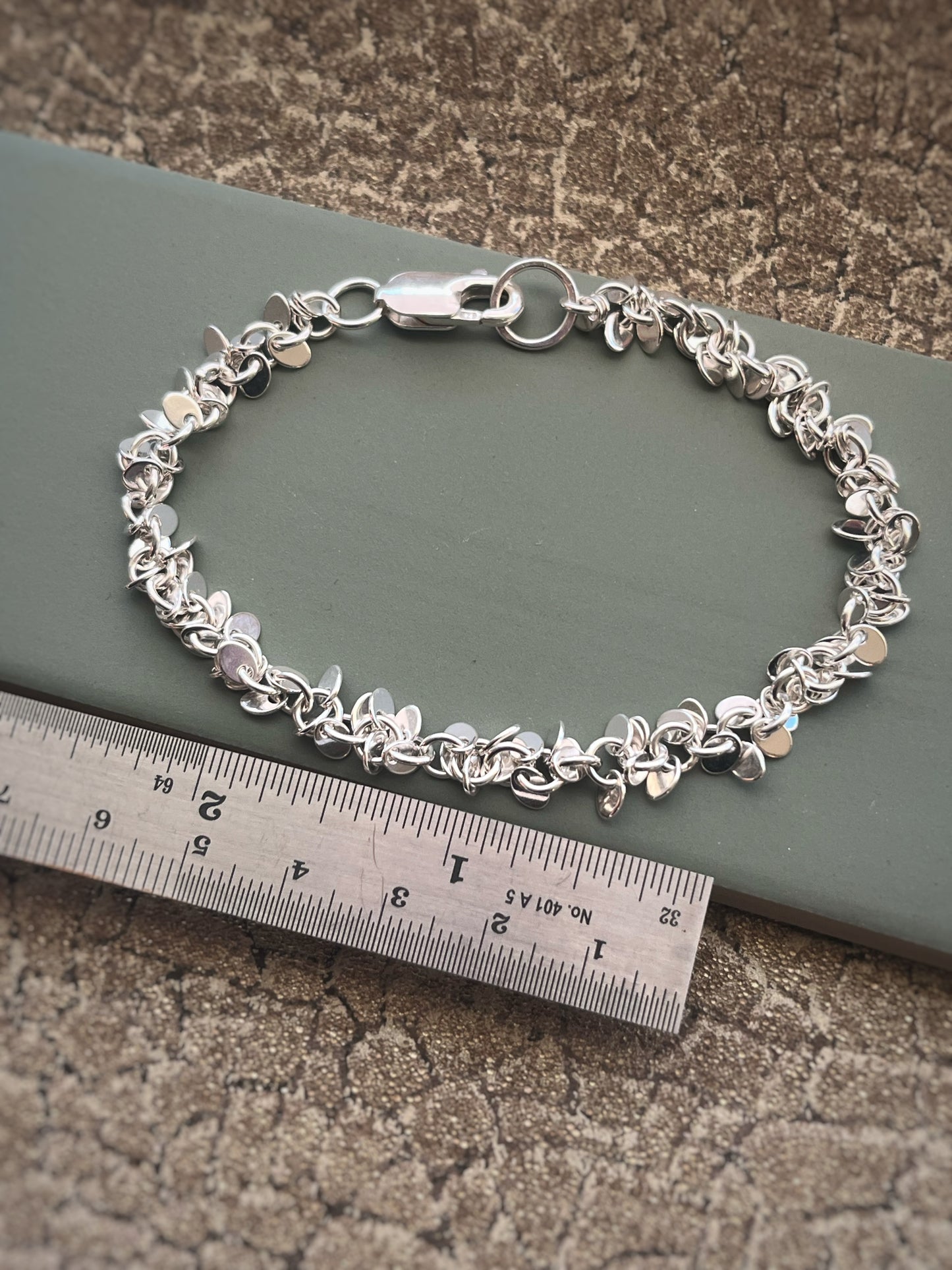 Multi disc sterling silver bracelet