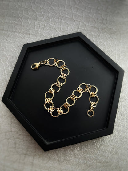 Solid 9ct gold hammered dimple sand coastal beach interlocking double yellow gold hoop bracelet
