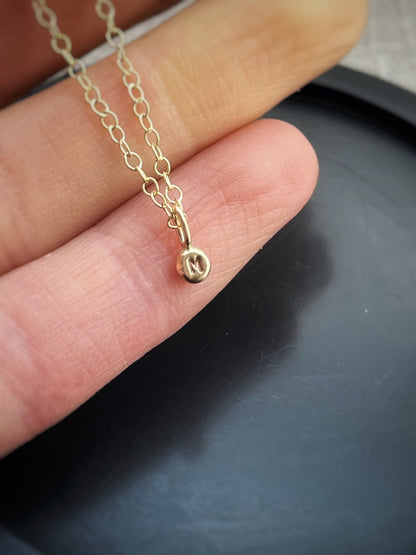 Solid 9ct gold tiny letter pebble bracelet, recycled personalised initial stacking handmade