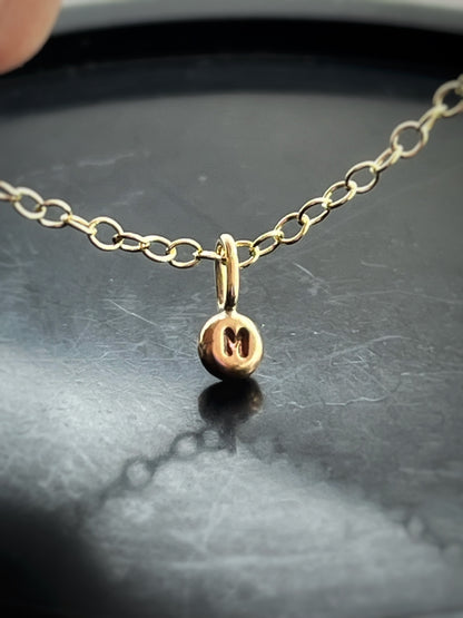 Solid 9ct gold tiny letter pebble bracelet, recycled personalised initial stacking handmade