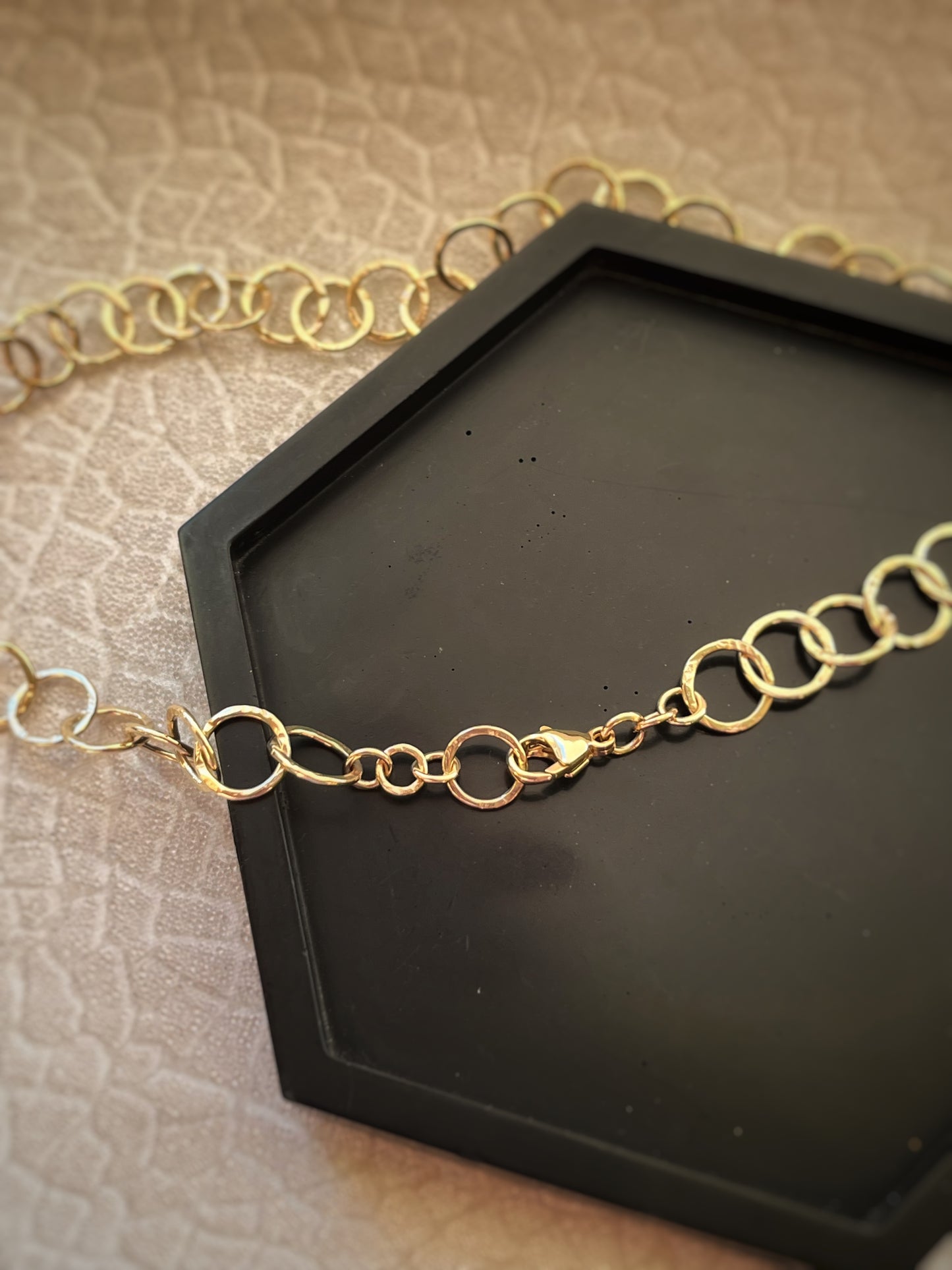 Solid 9ct recycled yellow gold, a hammered handmade hoop interlocking hoop tree bark texture necklace