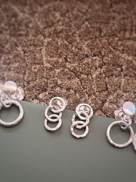 3 silver hammered hoop earrings