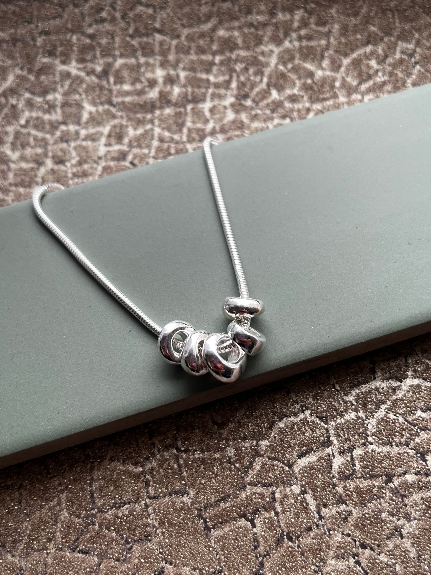 Sterling silver 5 pebble pendant necklace