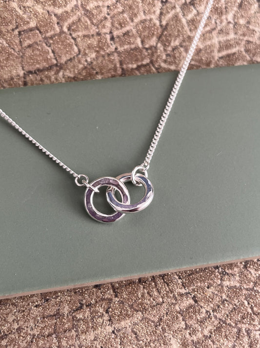 Sterling silver hammered chunky interlocking hoop necklace
