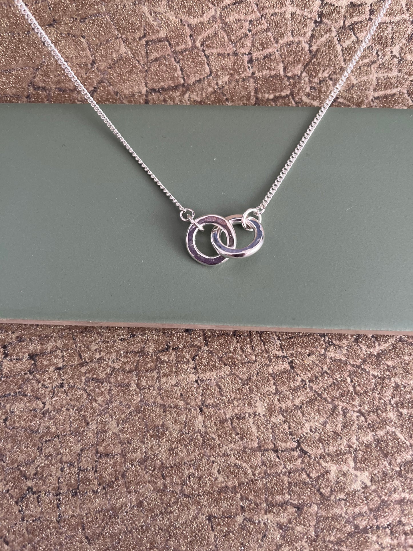 Sterling silver hammered chunky interlocking hoop necklace