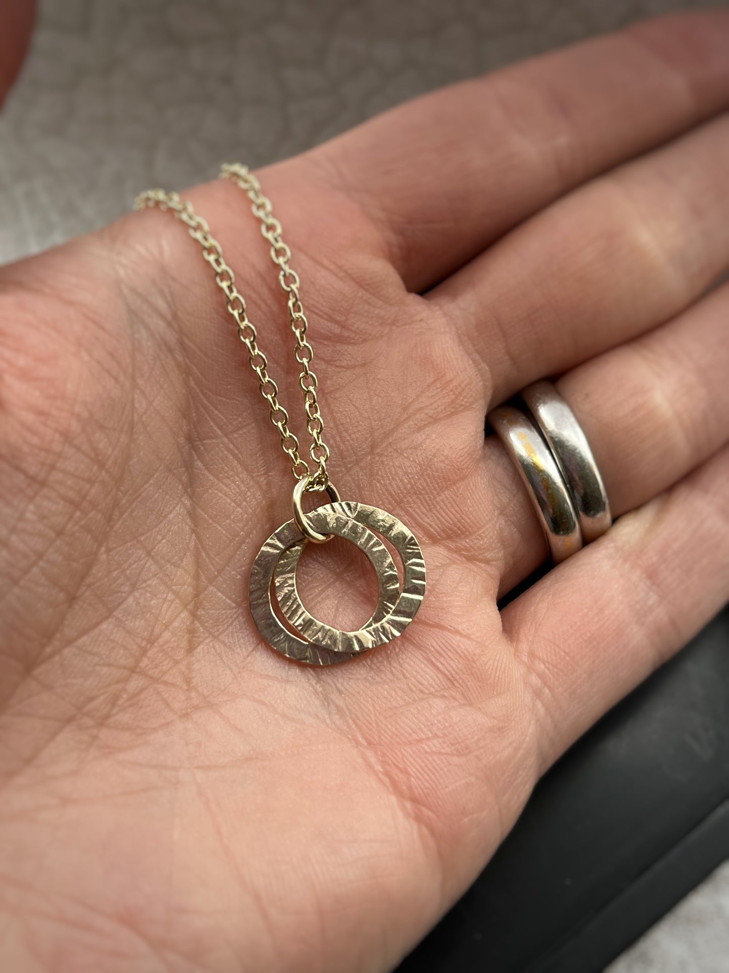 Solid 9ct gold large interlocking Russian twist style circle pendant, a handmade hammered textured necklace